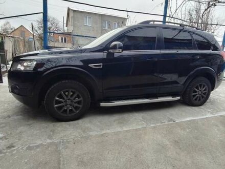 Черный Шевроле Каптива, объемом двигателя 2.41 л и пробегом 350 тыс. км за 10000 $, фото 1 на Automoto.ua