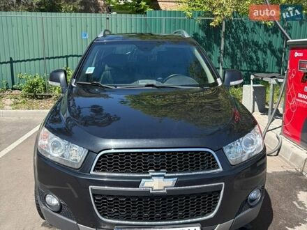 Черный Шевроле Каптива, объемом двигателя 2.4 л и пробегом 179 тыс. км за 9000 $, фото 1 на Automoto.ua