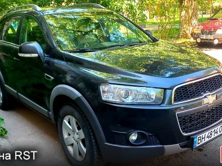 Черный Шевроле Каптива, объемом двигателя 2.4 л и пробегом 180 тыс. км за 9500 $, фото 1 на Automoto.ua