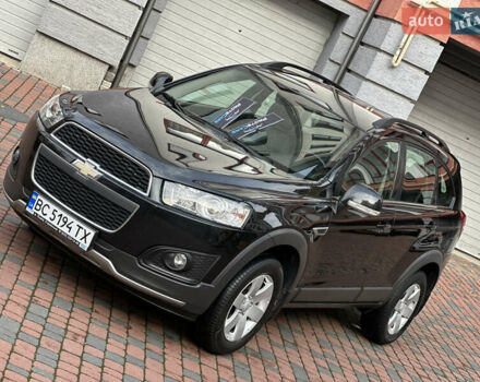 Черный Шевроле Каптива, объемом двигателя 2.38 л и пробегом 210 тыс. км за 11350 $, фото 1 на Automoto.ua