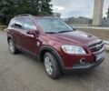 Красный Шевроле Каптива, объемом двигателя 1.99 л и пробегом 240 тыс. км за 7400 $, фото 1 на Automoto.ua