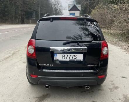 Красный Шевроле Каптива, объемом двигателя 2.4 л и пробегом 272 тыс. км за 7500 $, фото 2 на Automoto.ua