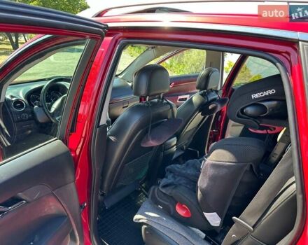 Красный Шевроле Каптива, объемом двигателя 2.38 л и пробегом 237 тыс. км за 9299 $, фото 9 на Automoto.ua