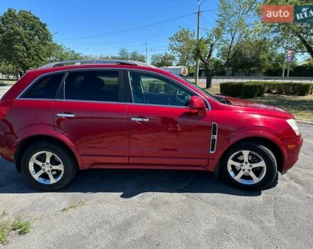 Красный Шевроле Каптива, объемом двигателя 2.38 л и пробегом 237 тыс. км за 9299 $, фото 3 на Automoto.ua