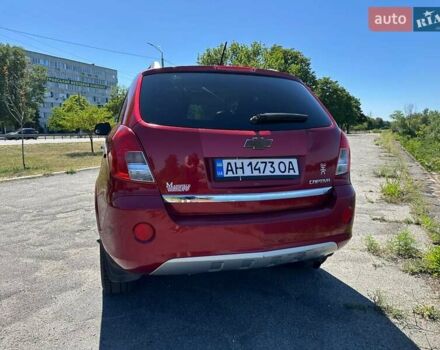 Красный Шевроле Каптива, объемом двигателя 2.38 л и пробегом 237 тыс. км за 9299 $, фото 5 на Automoto.ua