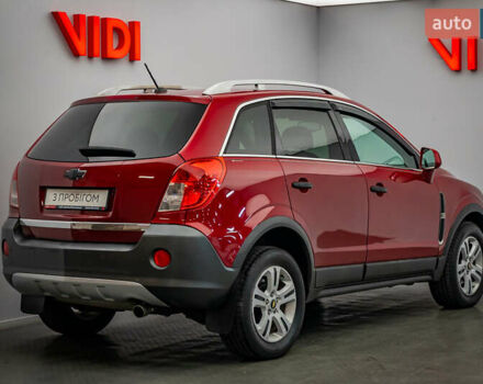 Красный Шевроле Каптива, объемом двигателя 2.4 л и пробегом 207 тыс. км за 9270 $, фото 1 на Automoto.ua