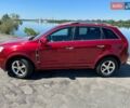 Красный Шевроле Каптива, объемом двигателя 2.38 л и пробегом 237 тыс. км за 9299 $, фото 1 на Automoto.ua