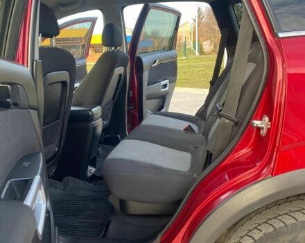 Красный Шевроле Каптива, объемом двигателя 2.4 л и пробегом 175 тыс. км за 8500 $, фото 2 на Automoto.ua