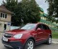 Красный Шевроле Каптива, объемом двигателя 2.4 л и пробегом 136 тыс. км за 9990 $, фото 1 на Automoto.ua