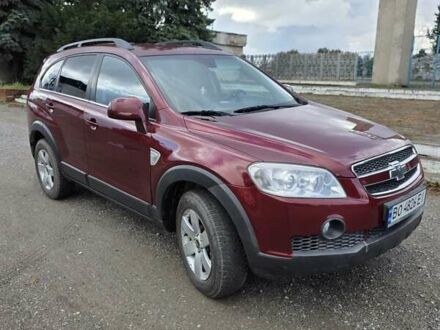 Красный Шевроле Каптива, объемом двигателя 1.99 л и пробегом 240 тыс. км за 7400 $, фото 1 на Automoto.ua