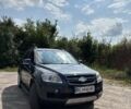 Серый Шевроле Каптива, объемом двигателя 2 л и пробегом 205 тыс. км за 7000 $, фото 1 на Automoto.ua
