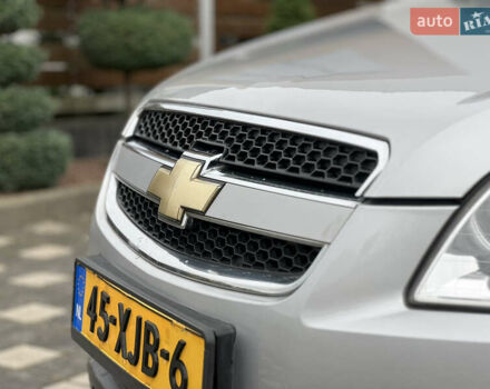 Серый Шевроле Каптива, объемом двигателя 2.4 л и пробегом 202 тыс. км за 7700 $, фото 12 на Automoto.ua