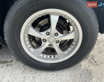 Серый Шевроле Каптива, объемом двигателя 2.38 л и пробегом 250 тыс. км за 10800 $, фото 3 на Automoto.ua