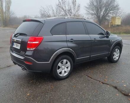 Серый Шевроле Каптива, объемом двигателя 2.38 л и пробегом 135 тыс. км за 13800 $, фото 1 на Automoto.ua