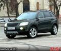 Зеленый Шевроле Каптива, объемом двигателя 2.4 л и пробегом 260 тыс. км за 7300 $, фото 1 на Automoto.ua
