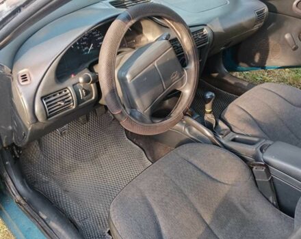 Зеленый Шевроле Кавалер, объемом двигателя 2.2 л и пробегом 360 тыс. км за 600 $, фото 12 на Automoto.ua