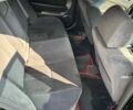 Чорний Шевроле Чєвєттє, об'ємом двигуна 2 л та пробігом 216 тис. км за 4499 $, фото 5 на Automoto.ua