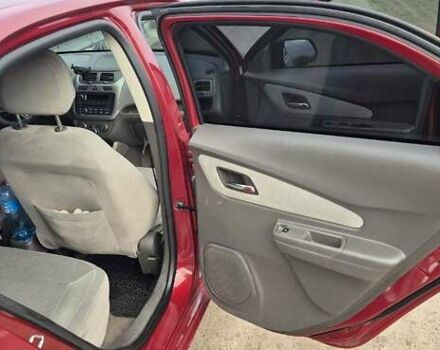 Червоний Шевроле Кобальт, об'ємом двигуна 1.49 л та пробігом 79 тис. км за 9500 $, фото 13 на Automoto.ua