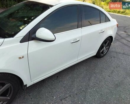 Белый Шевроле Круз, объемом двигателя 1.8 л и пробегом 157 тыс. км за 7400 $, фото 5 на Automoto.ua