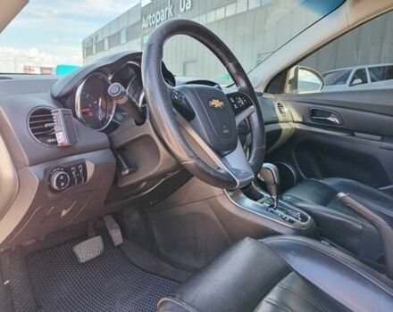 Белый Шевроле Круз, объемом двигателя 1.8 л и пробегом 198 тыс. км за 6690 $, фото 21 на Automoto.ua