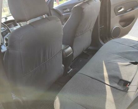 Черный Шевроле Круз, объемом двигателя 1.8 л и пробегом 140 тыс. км за 7000 $, фото 3 на Automoto.ua