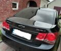 Чорний Шевроле Круз, об'ємом двигуна 2 л та пробігом 286 тис. км за 6900 $, фото 3 на Automoto.ua