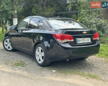 Черный Шевроле Круз, объемом двигателя 1.8 л и пробегом 144 тыс. км за 5999 $, фото 2 на Automoto.ua