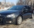 Черный Шевроле Круз, объемом двигателя 1.6 л и пробегом 140 тыс. км за 9700 $, фото 1 на Automoto.ua
