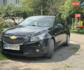 Черный Шевроле Круз, объемом двигателя 1.8 л и пробегом 144 тыс. км за 5499 $, фото 1 на Automoto.ua