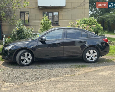 Черный Шевроле Круз, объемом двигателя 1.8 л и пробегом 144 тыс. км за 5999 $, фото 1 на Automoto.ua