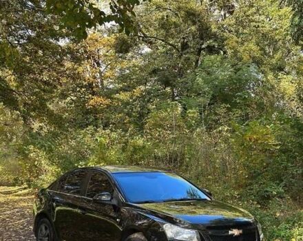 Черный Шевроле Круз, объемом двигателя 1.8 л и пробегом 177 тыс. км за 6400 $, фото 1 на Automoto.ua