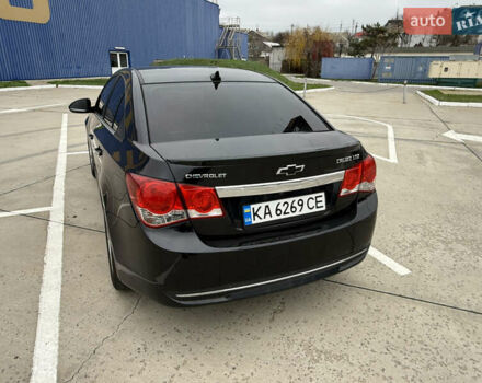 Черный Шевроле Круз, объемом двигателя 1.8 л и пробегом 141 тыс. км за 7700 $, фото 2 на Automoto.ua