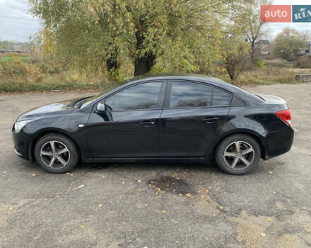 Черный Шевроле Круз, объемом двигателя 1.8 л и пробегом 195 тыс. км за 6200 $, фото 7 на Automoto.ua