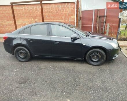 Черный Шевроле Круз, объемом двигателя 2 л и пробегом 252 тыс. км за 6200 $, фото 1 на Automoto.ua