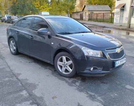 Черный Шевроле Круз, объемом двигателя 1.8 л и пробегом 242 тыс. км за 6400 $, фото 1 на Automoto.ua