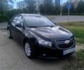 Черный Шевроле Круз, объемом двигателя 1.8 л и пробегом 142 тыс. км за 6500 $, фото 1 на Automoto.ua