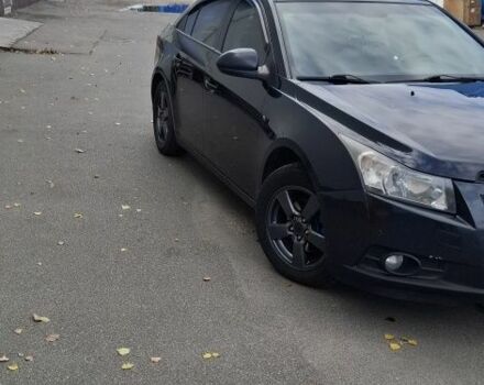 Черный Шевроле Круз, объемом двигателя 1.8 л и пробегом 314 тыс. км за 5500 $, фото 1 на Automoto.ua