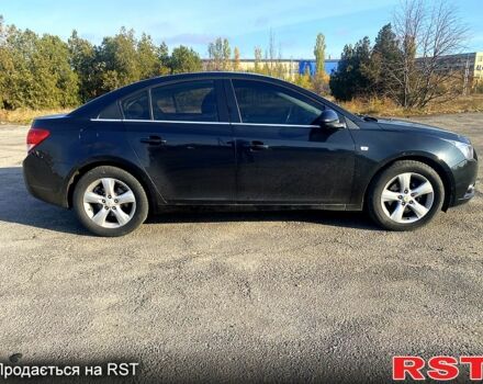 Черный Шевроле Круз, объемом двигателя 1.7 л и пробегом 221 тыс. км за 8000 $, фото 4 на Automoto.ua