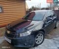 Черный Шевроле Круз, объемом двигателя 1.69 л и пробегом 157 тыс. км за 9300 $, фото 1 на Automoto.ua