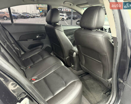 Черный Шевроле Круз, объемом двигателя 1.4 л и пробегом 243 тыс. км за 5800 $, фото 14 на Automoto.ua