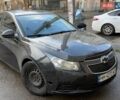 Черный Шевроле Круз, объемом двигателя 1.8 л и пробегом 240 тыс. км за 5300 $, фото 1 на Automoto.ua