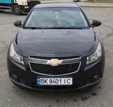 Черный Шевроле Круз, объемом двигателя 1.8 л и пробегом 220 тыс. км за 6600 $, фото 1 на Automoto.ua