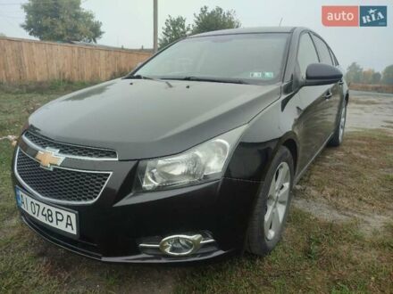 Шевроле Круз 2011 у Малине на Automoto.ua Чорний Шевроле Круз, об'ємом двигуна 1.4 л та пробігом 147 тис. км за 6999 $, фото 1 на Automoto.ua