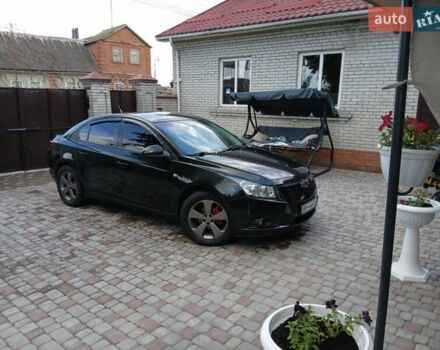 Черный Шевроле Круз, объемом двигателя 1.8 л и пробегом 174 тыс. км за 7499 $, фото 1 на Automoto.ua