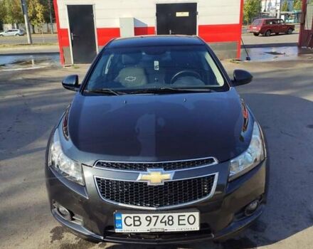 Черный Шевроле Круз, объемом двигателя 1.8 л и пробегом 140 тыс. км за 7000 $, фото 1 на Automoto.ua