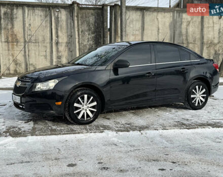 Черный Шевроле Круз, объемом двигателя 1.8 л и пробегом 255 тыс. км за 5600 $, фото 1 на Automoto.ua