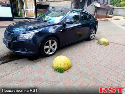 Черный Шевроле Круз, объемом двигателя 1.8 л и пробегом 332 тыс. км за 6000 $, фото 1 на Automoto.ua