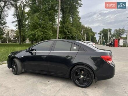 Черный Шевроле Круз, объемом двигателя 1.8 л и пробегом 125 тыс. км за 8200 $, фото 1 на Automoto.ua