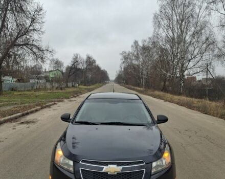 Черный Шевроле Круз, объемом двигателя 1.8 л и пробегом 328 тыс. км за 4750 $, фото 1 на Automoto.ua