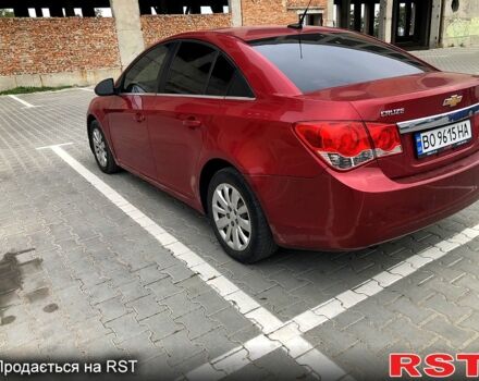 Красный Шевроле Круз, объемом двигателя 1.4 л и пробегом 235 тыс. км за 6400 $, фото 2 на Automoto.ua